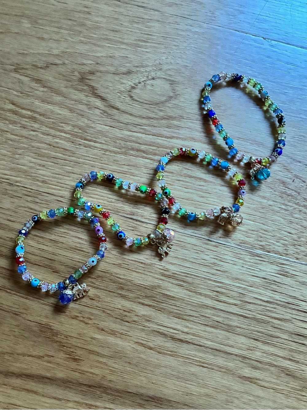 Evil eye Multicolor Beaded Charm Bracelets. 4 boho style beachy
